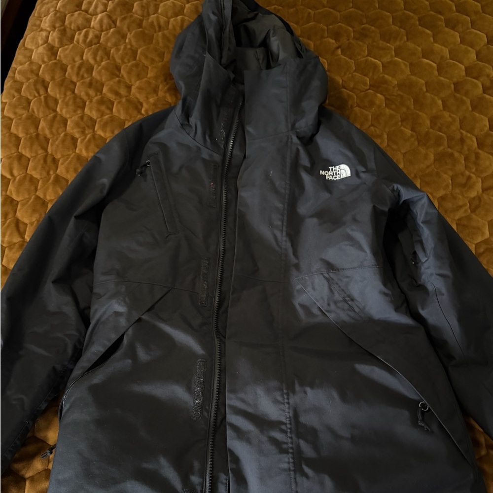 Women’s The North Face Charcoal Puffer Jacket. Size Small